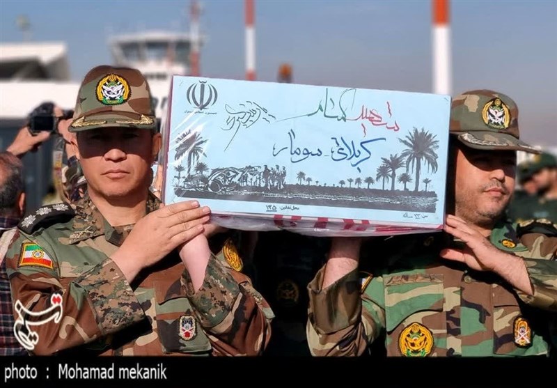 پیکر مطهر 14 شهید گمنام دفاع وارد مشهد شد + فیلم و تصاویر