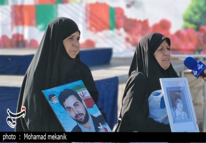 پیکر مطهر 14 شهید گمنام دفاع وارد مشهد شد + فیلم و تصاویر