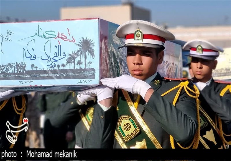 پیکر مطهر 14 شهید گمنام دفاع وارد مشهد شد + فیلم و تصاویر
