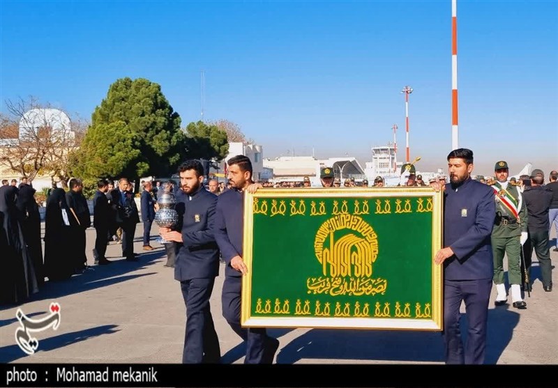 پیکر مطهر 14 شهید گمنام دفاع وارد مشهد شد + فیلم و تصاویر