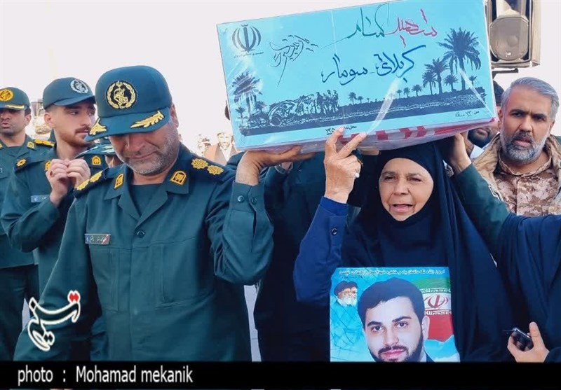پیکر مطهر 14 شهید گمنام دفاع وارد مشهد شد + فیلم و تصاویر